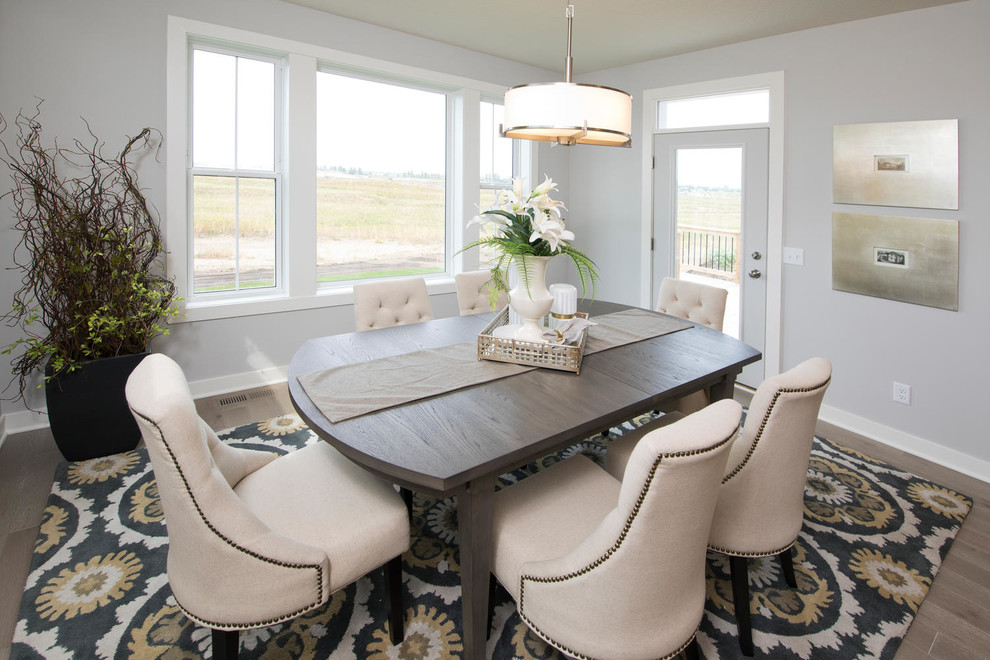 Example of a transitional dining room design in Minneapolis