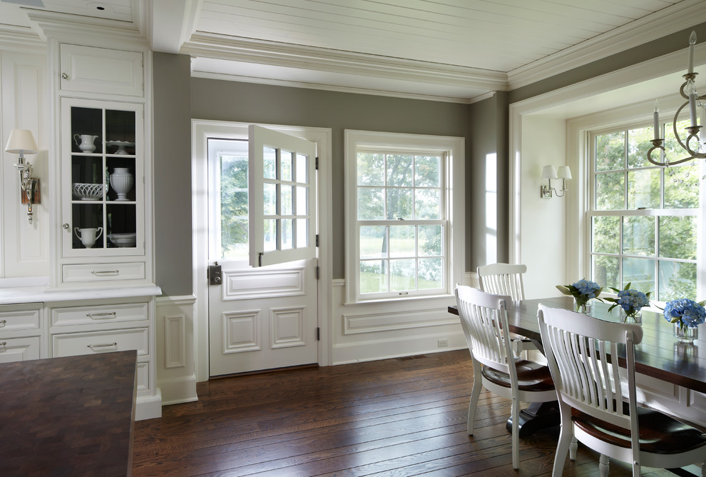 Traditional dining room in Minneapolis with grey walls.