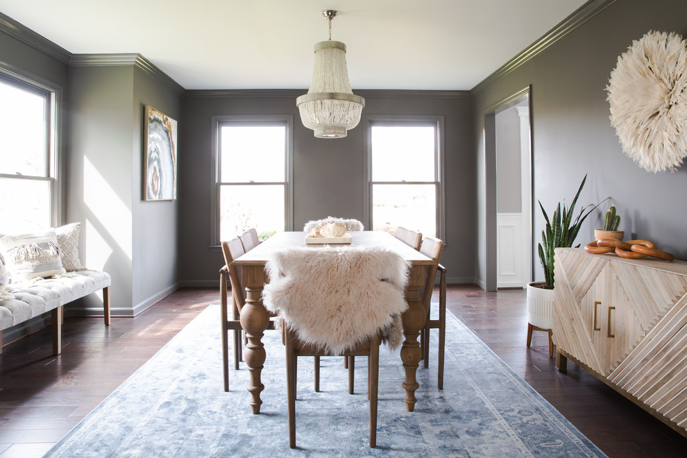 Transitional dark wood floor and brown floor enclosed dining room photo in Philadelphia with gray walls