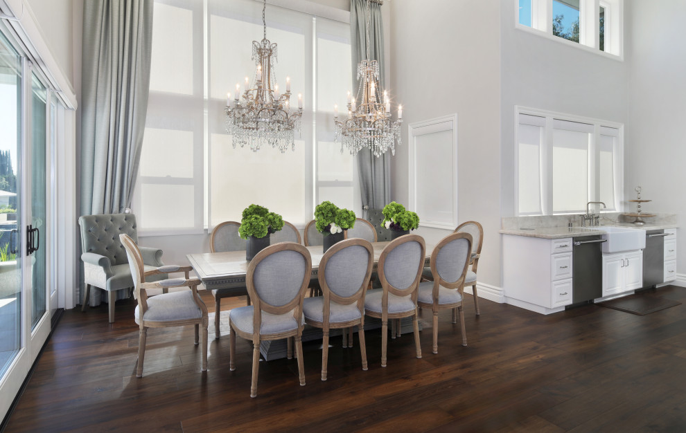 Design ideas for a medium sized coastal open plan dining room in Orange County with grey walls, medium hardwood flooring and brown floors.