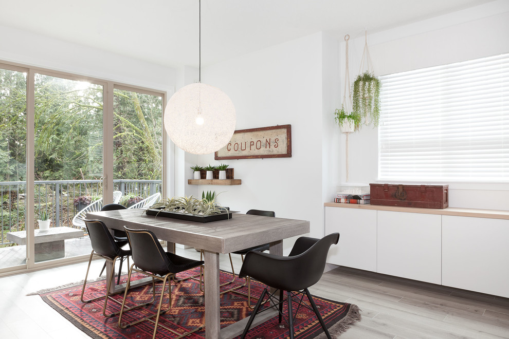 This is an example of a scandinavian dining room in Vancouver.
