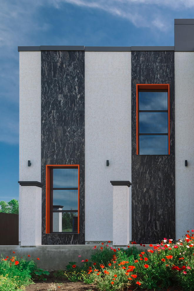 Zweistöckiges Modernes Haus mit Flachdach, Mix-Fassade und bunter Fassadenfarbe in Sonstige