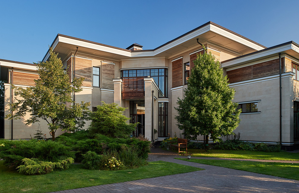 Imagen de fachada de casa beige contemporánea