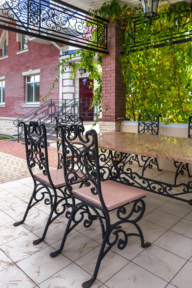 Foto di un patio o portico tradizionale