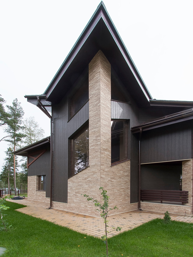 Стильный дизайн: дом среднего размера в современном стиле - последний тренд