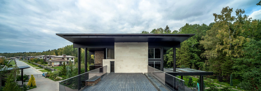 Idee per la villa contemporanea a due piani con tetto a capanna e copertura in metallo o lamiera