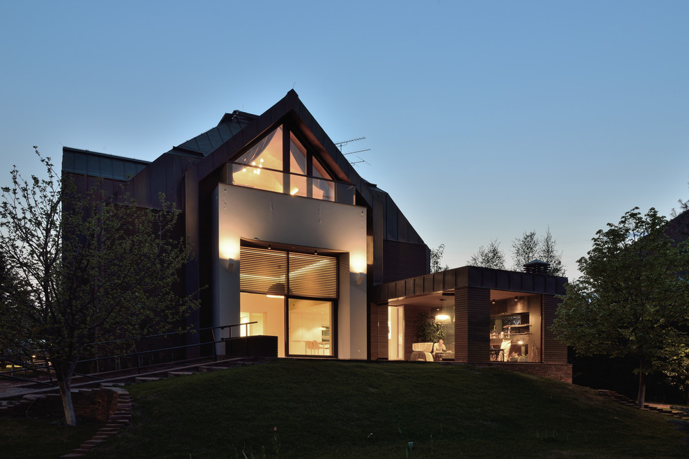 Пример оригинального дизайна: большой дом в современном стиле