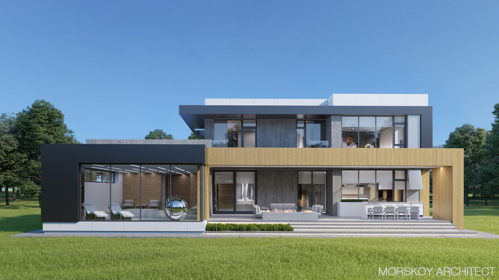 Idee per la villa bianca moderna a due piani di medie dimensioni con rivestimenti misti e tetto piano