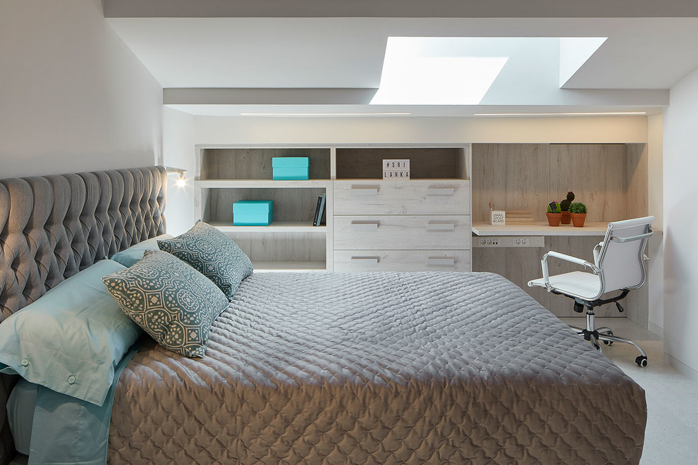 Design ideas for a contemporary gender neutral teen’s room in Barcelona with white walls and white floors.