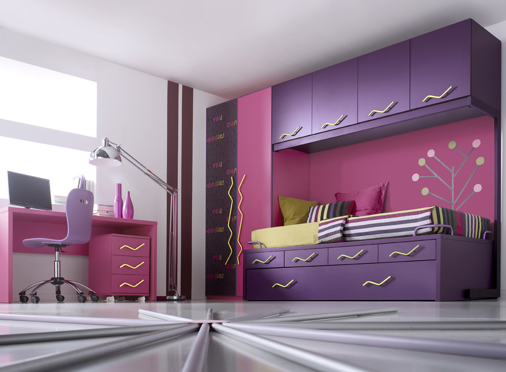 This is an example of a medium sized contemporary teen’s room for girls in Valencia.