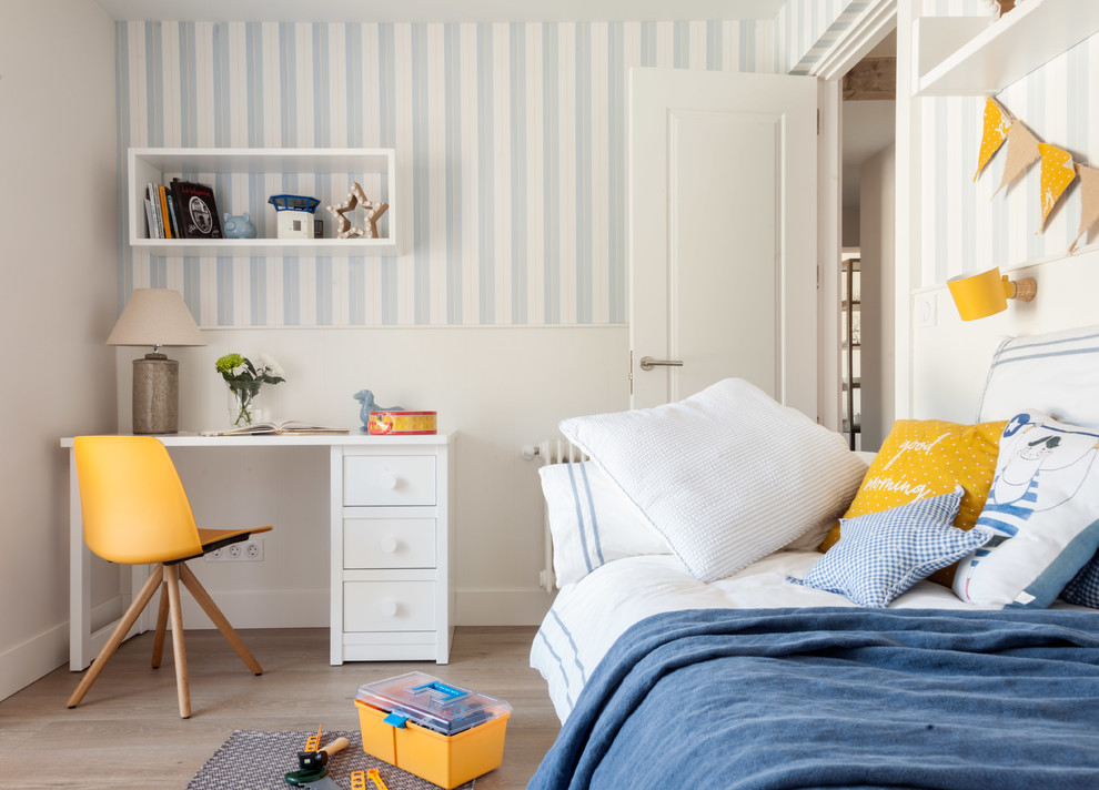 Kids' room - contemporary boy medium tone wood floor and brown floor kids' room idea in Other with blue walls