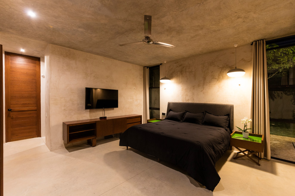 Modernes Schlafzimmer mit grauer Wandfarbe, Betonboden und grauem Boden in Mexiko Stadt