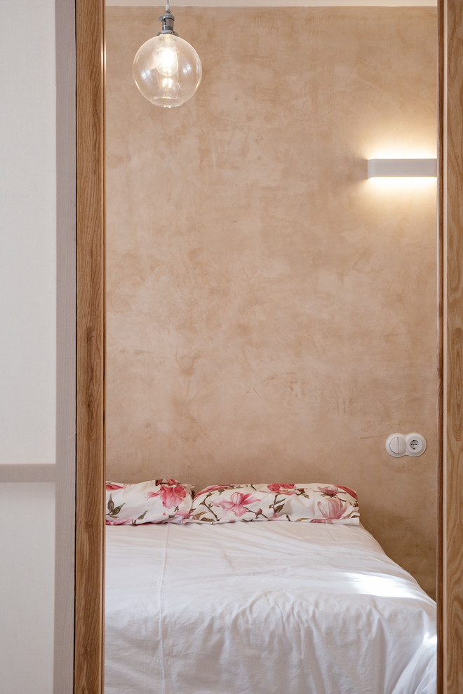 Bedroom - industrial bedroom idea in Seville