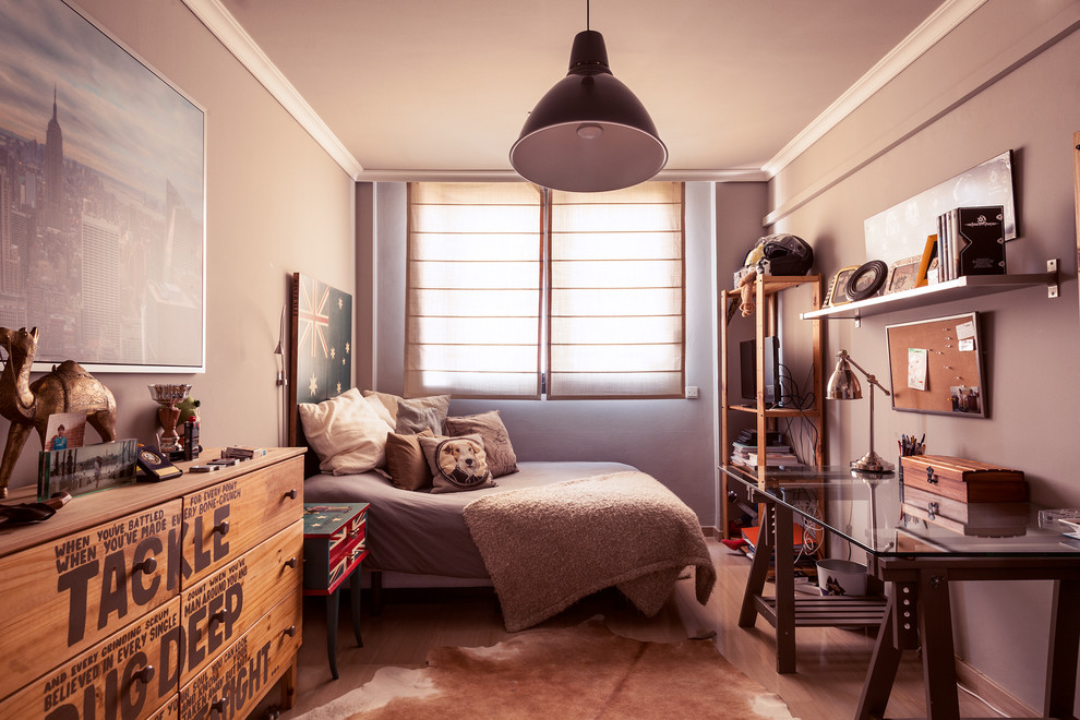 Design ideas for a medium sized urban master bedroom in Madrid with grey walls and no fireplace.