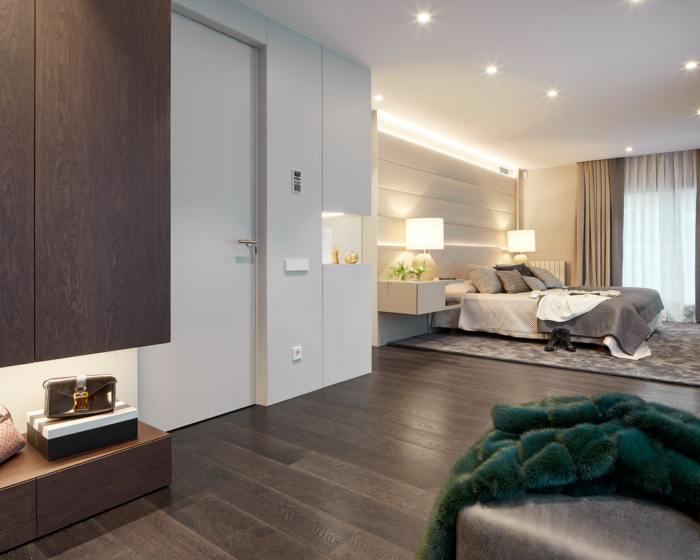 Bedroom - contemporary master dark wood floor and brown floor bedroom idea in Barcelona with white walls