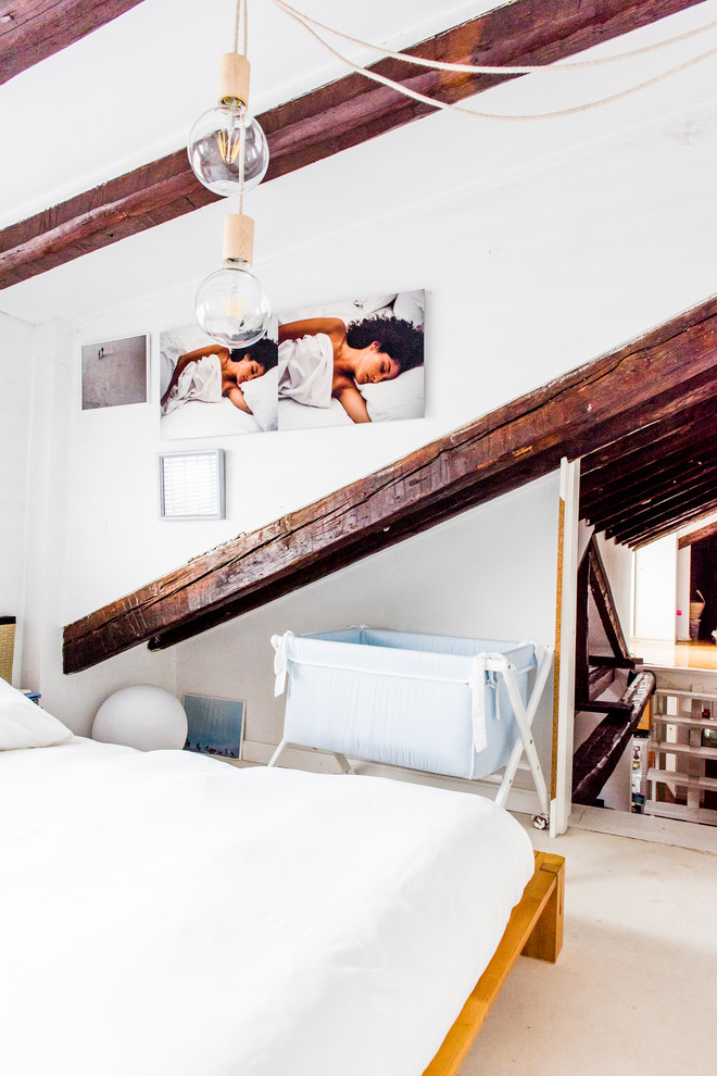 Medium sized mediterranean mezzanine bedroom in Madrid with white walls and no fireplace.
