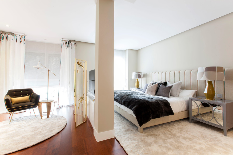 Bedroom - large eclectic master dark wood floor bedroom idea in Madrid with beige walls and no fireplace