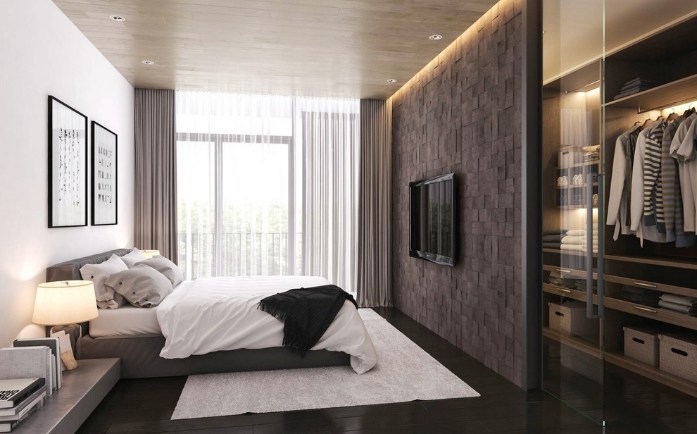 Inspiration for a large contemporary master bedroom in Madrid with multi-coloured walls.