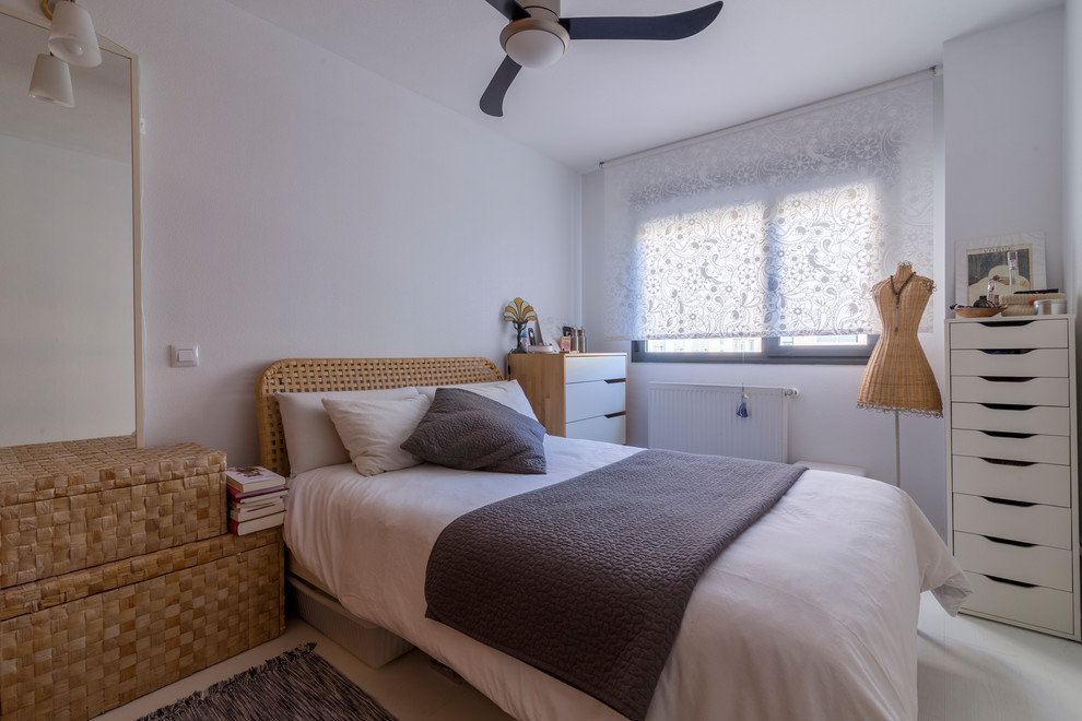 Example of a beach style bedroom design in Madrid