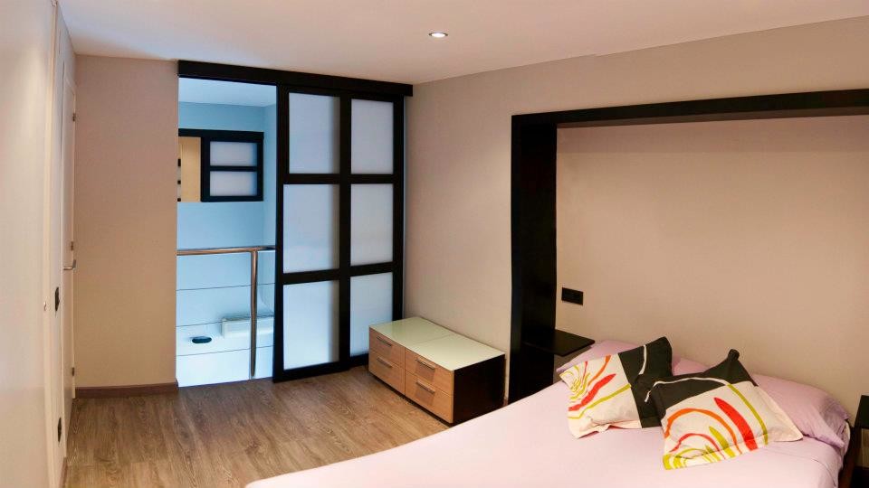 World-inspired bedroom in Barcelona.
