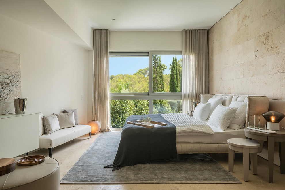 Bedroom - contemporary beige floor bedroom idea in Palma de Mallorca with beige walls