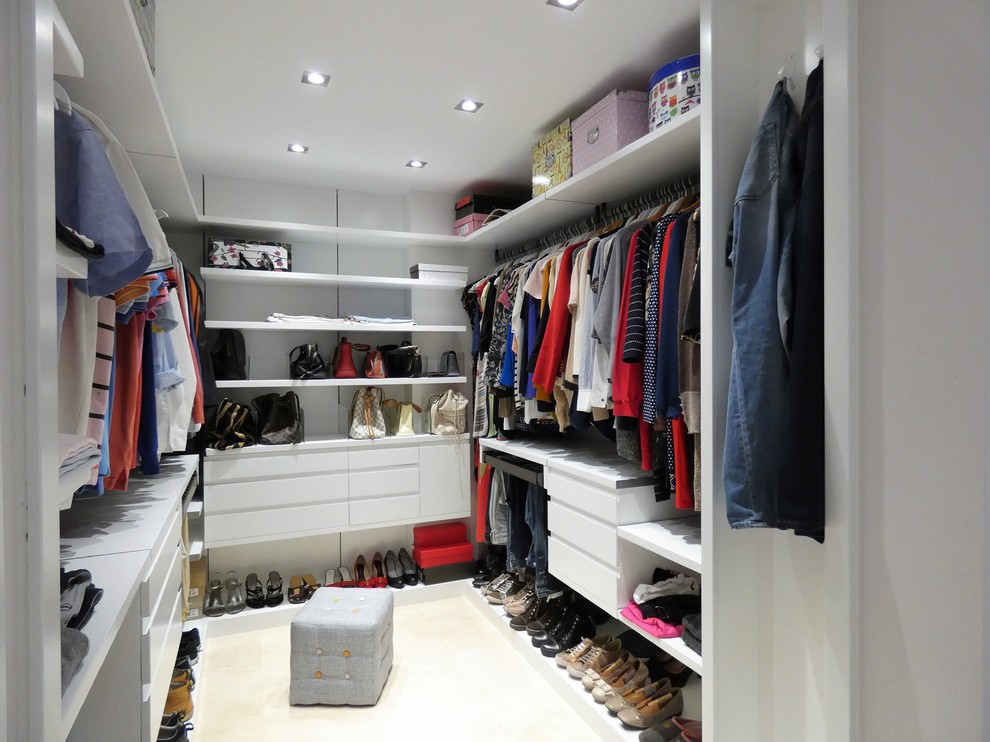 Photo of a medium sized modern wardrobe in Alicante-Costa Blanca with ceramic flooring and white floors.
