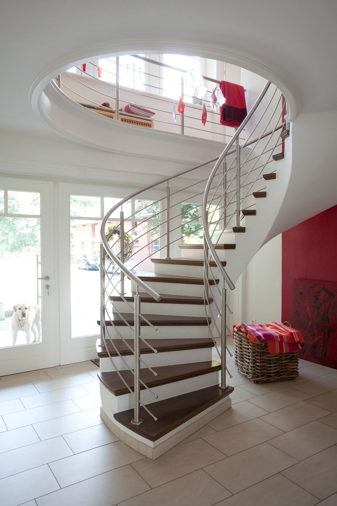 Example of a trendy staircase design in Other