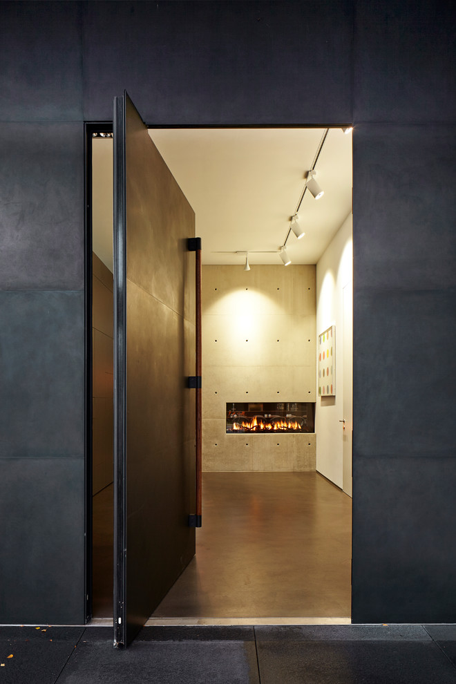 Idéer för att renovera en stor funkis foajé, med grå väggar, vinylgolv, en pivotdörr, en svart dörr och grått golv