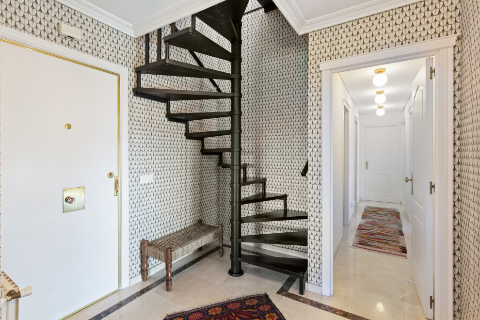 Medium sized bohemian front door in Madrid with multi-coloured walls, marble flooring, a single front door, a white front door, beige floors, a drop ceiling and wallpapered walls.