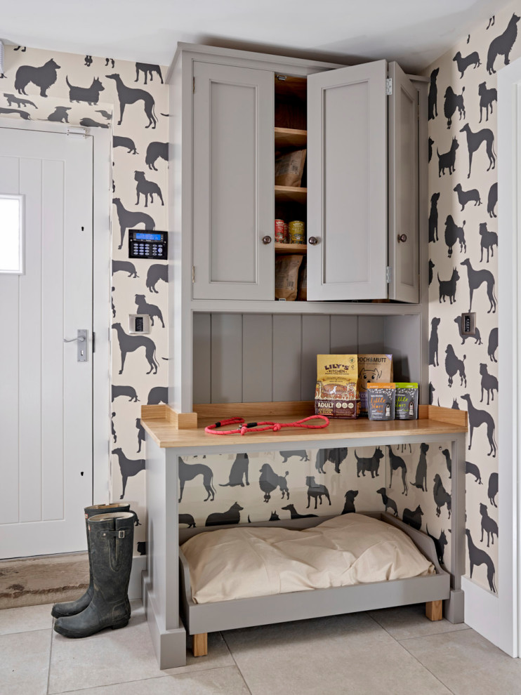 Photo of a medium sized country boot room in Other with multi-coloured walls, grey floors and wallpapered walls.