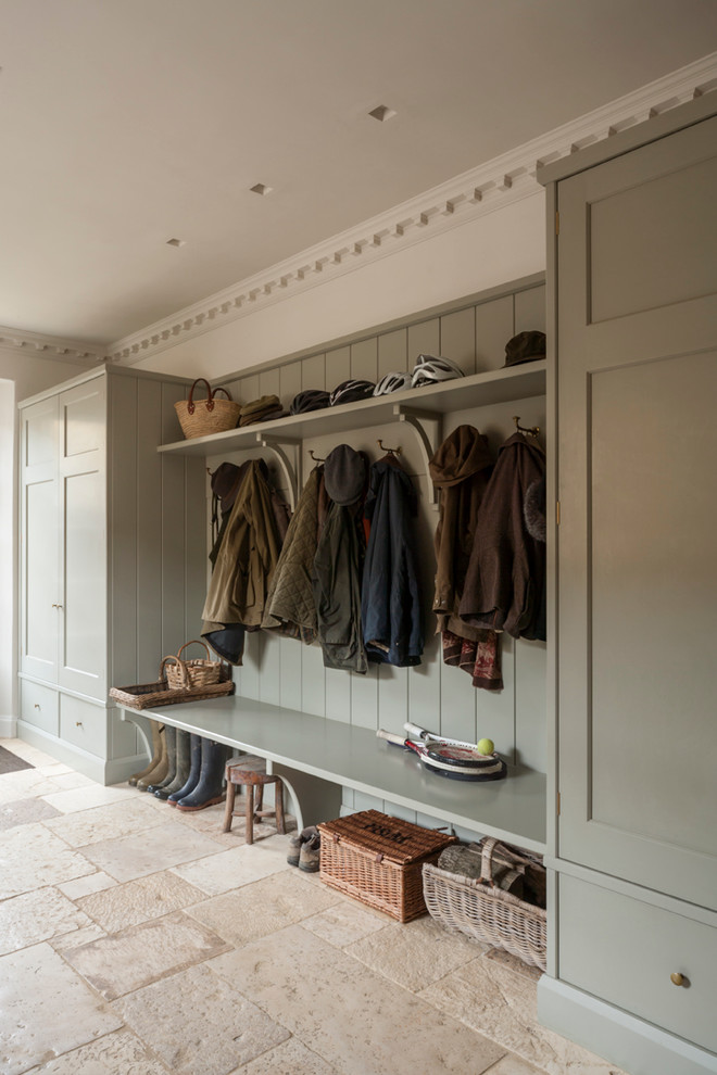 Medium sized country entrance in Gloucestershire with white walls and limestone flooring.