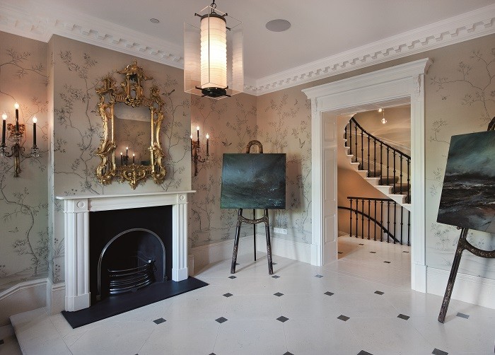 Large trendy ceramic tile foyer photo in London with multicolored walls