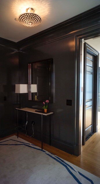 Entryway - traditional medium tone wood floor entryway idea in Boston with gray walls