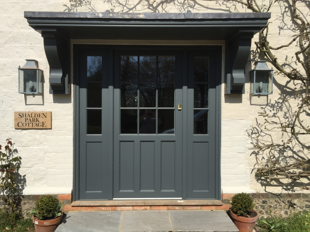 Photo of a classic front door in Hampshire with a single front door and a grey front door.