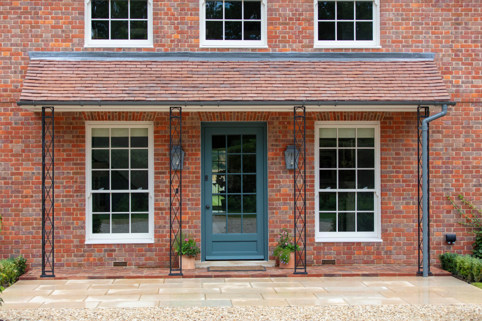Inspiration for a medium sized classic front door in Buckinghamshire with a single front door and a blue front door.