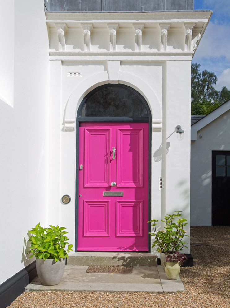 Inspiration for a bohemian entrance in Kent with a single front door.