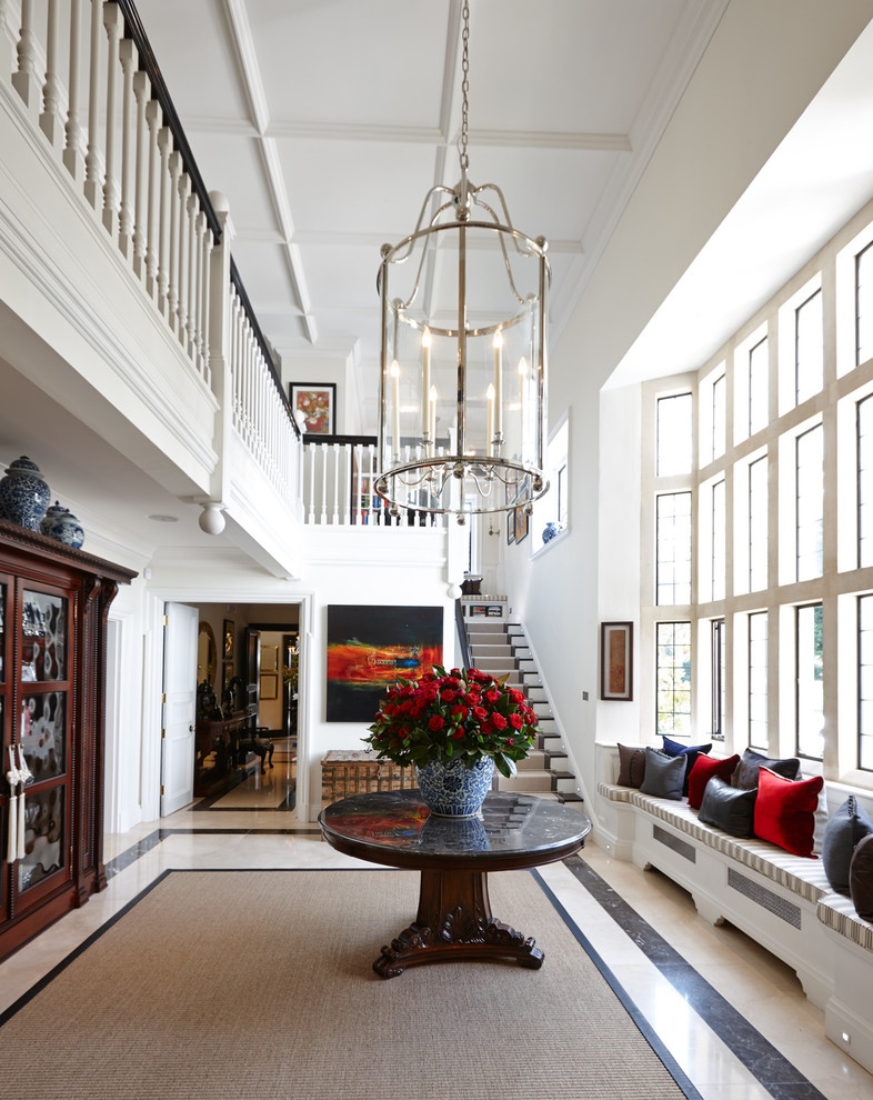 Large traditional entrance in London with white walls.