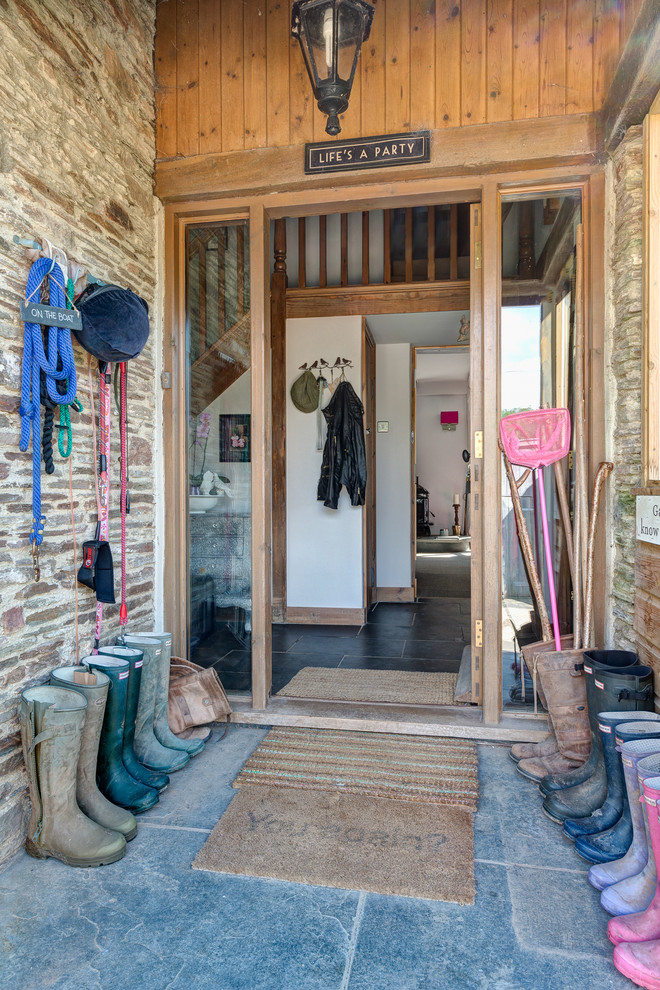 Example of a farmhouse entryway design in Devon