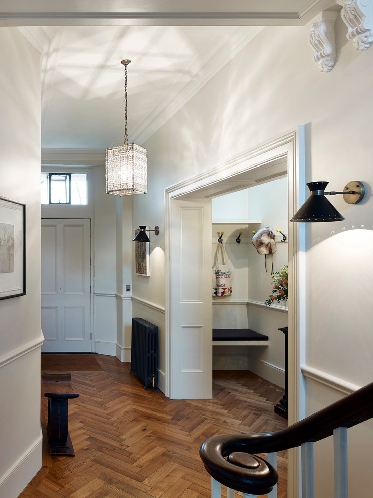 Photo of a bohemian entrance in London with a dado rail.