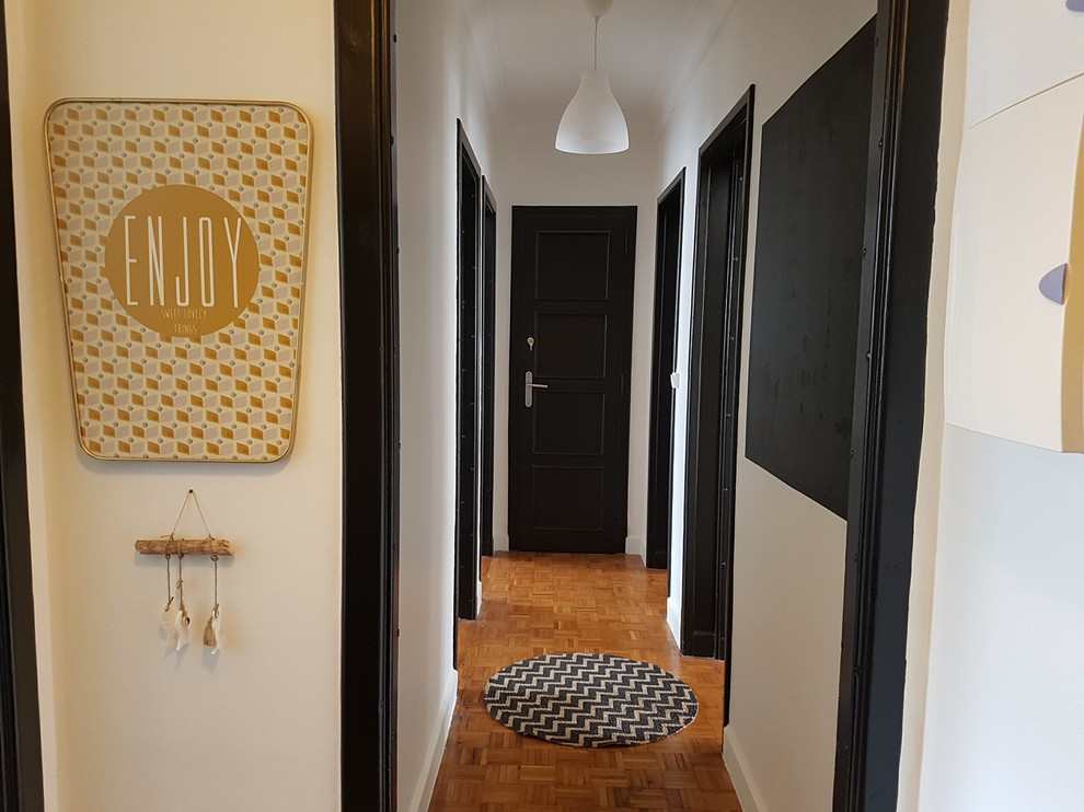 Example of an eclectic entryway design in Other