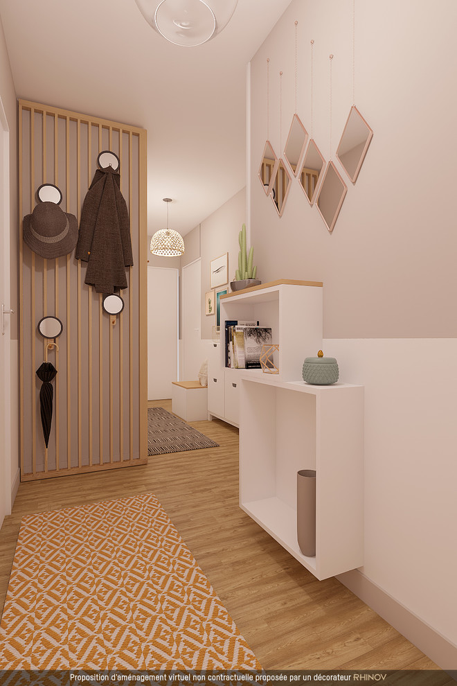 Design ideas for a scandinavian hallway in Bordeaux with light hardwood flooring.
