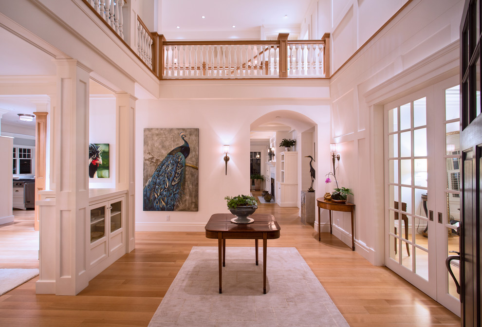 Medium sized nautical foyer in Seattle with white walls, light hardwood flooring, a single front door and a dark wood front door.