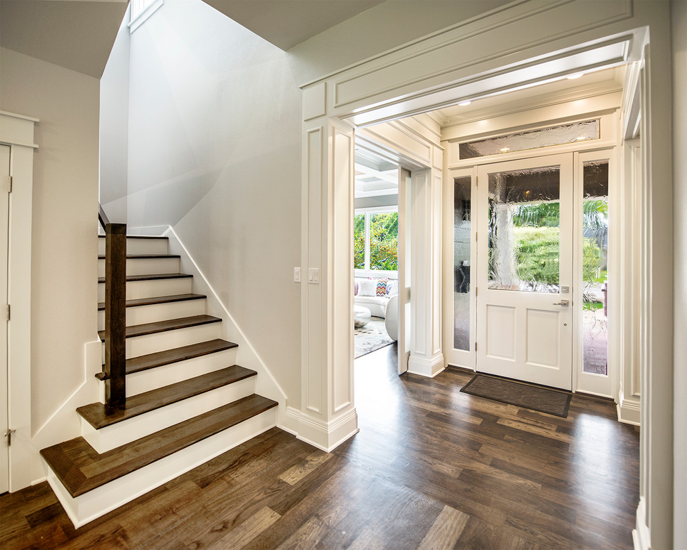 Inspiration for a craftsman entryway remodel in Austin with a white front door and gray walls