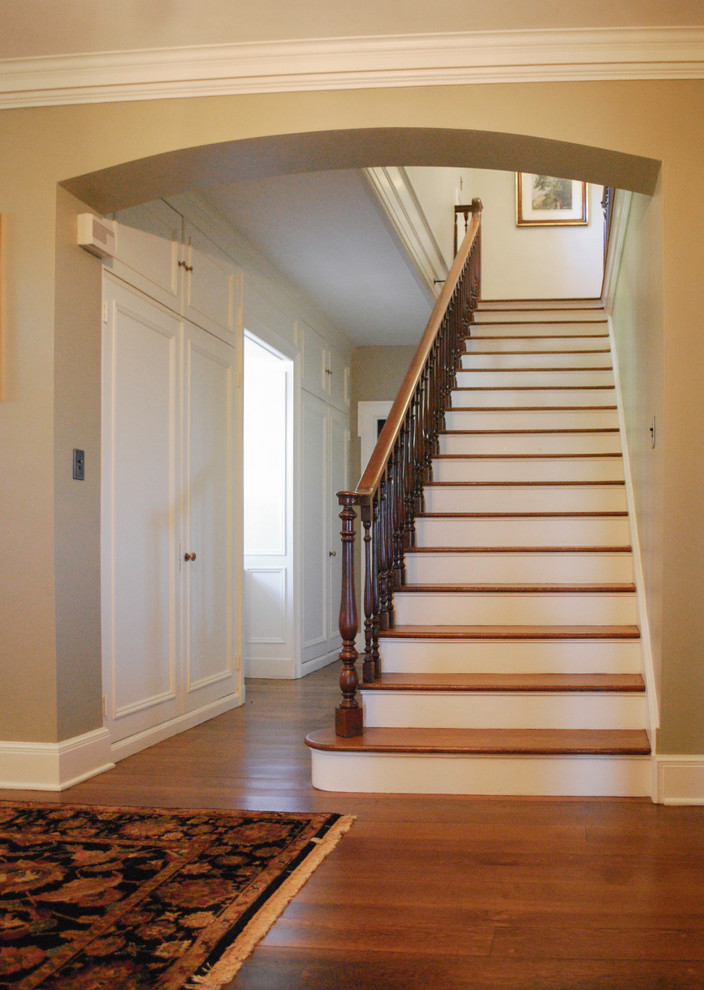 Inspiration for a medium sized farmhouse foyer in DC Metro with beige walls and medium hardwood flooring.
