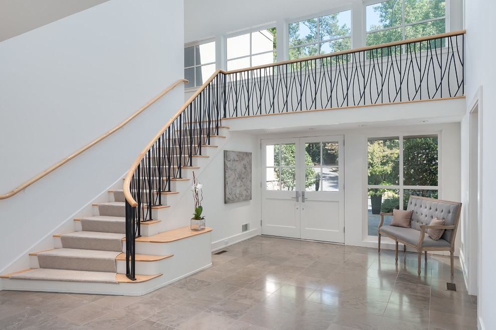 Photo of a medium sized contemporary foyer in Atlanta with white walls, marble flooring, a double front door, a white front door and grey floors.