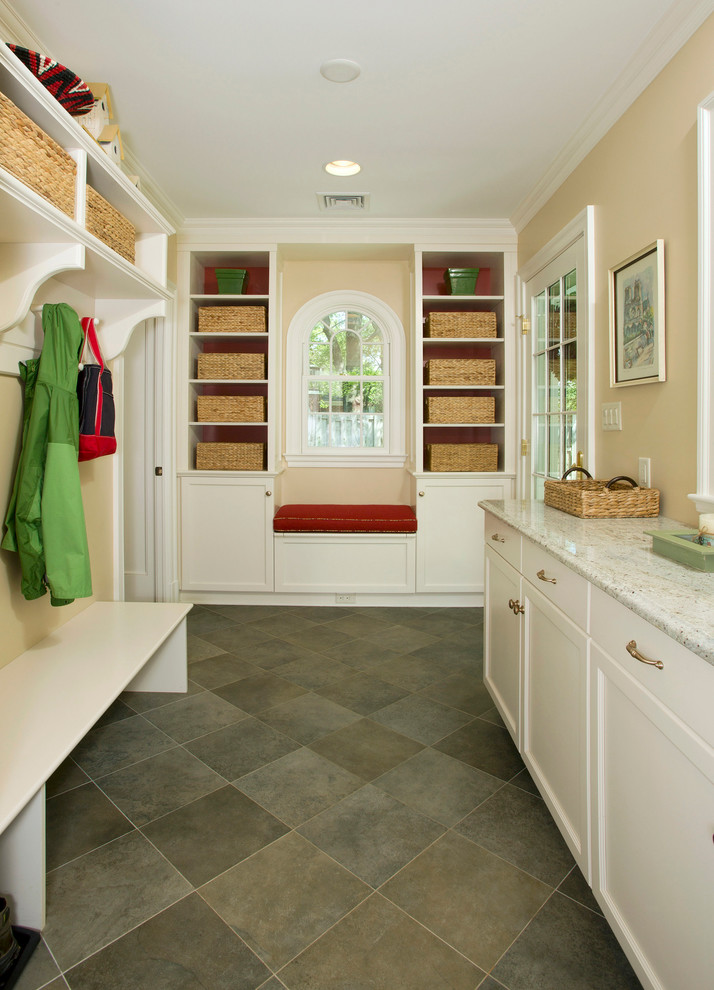 Inspiration for a timeless mudroom remodel in DC Metro with beige walls