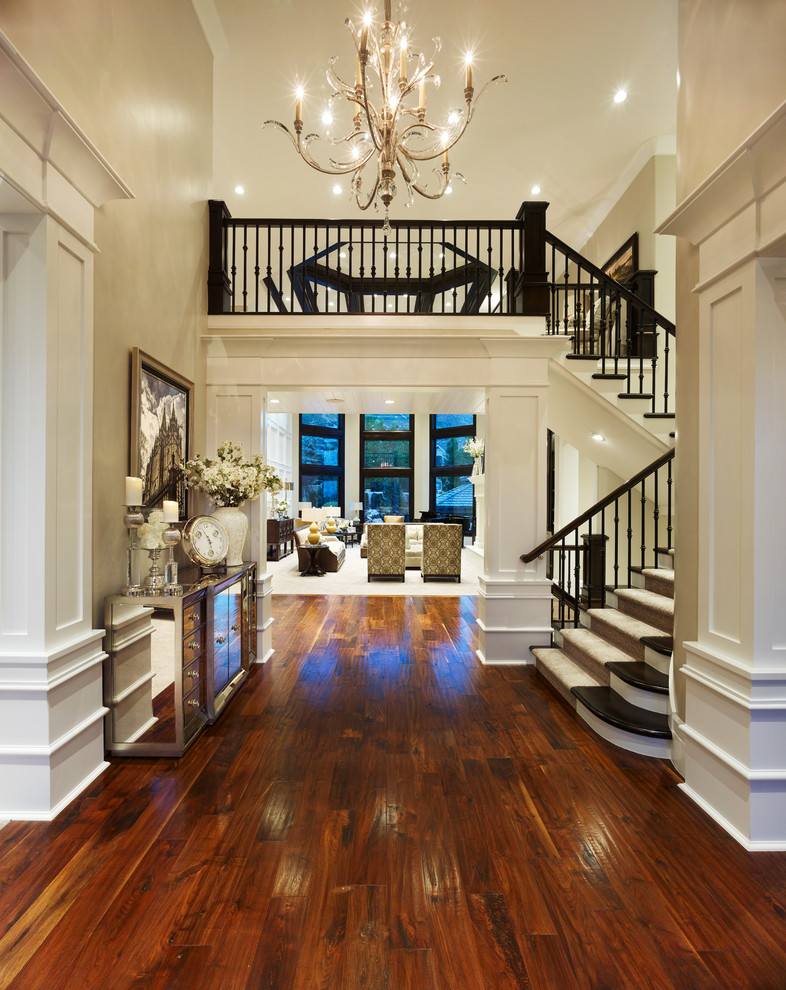 Inspiration for a mid-sized transitional dark wood floor and brown floor front door remodel in Salt Lake City with beige walls