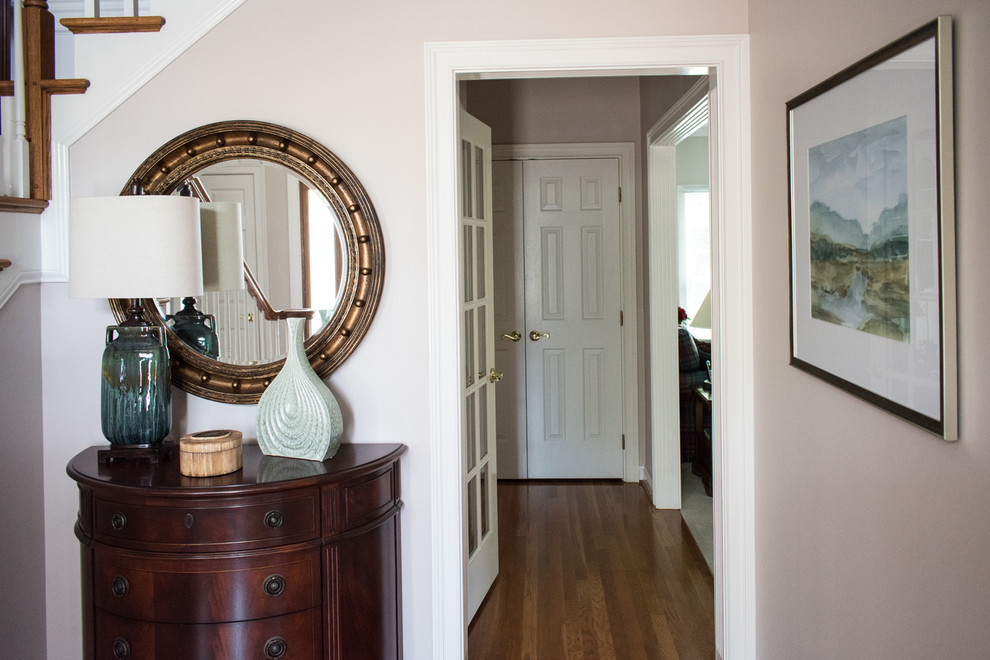 This is an example of a medium sized classic foyer in Louisville with a single front door.