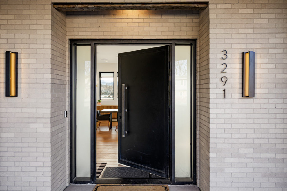Photo of a modern front door in Denver with a single front door and a black front door.