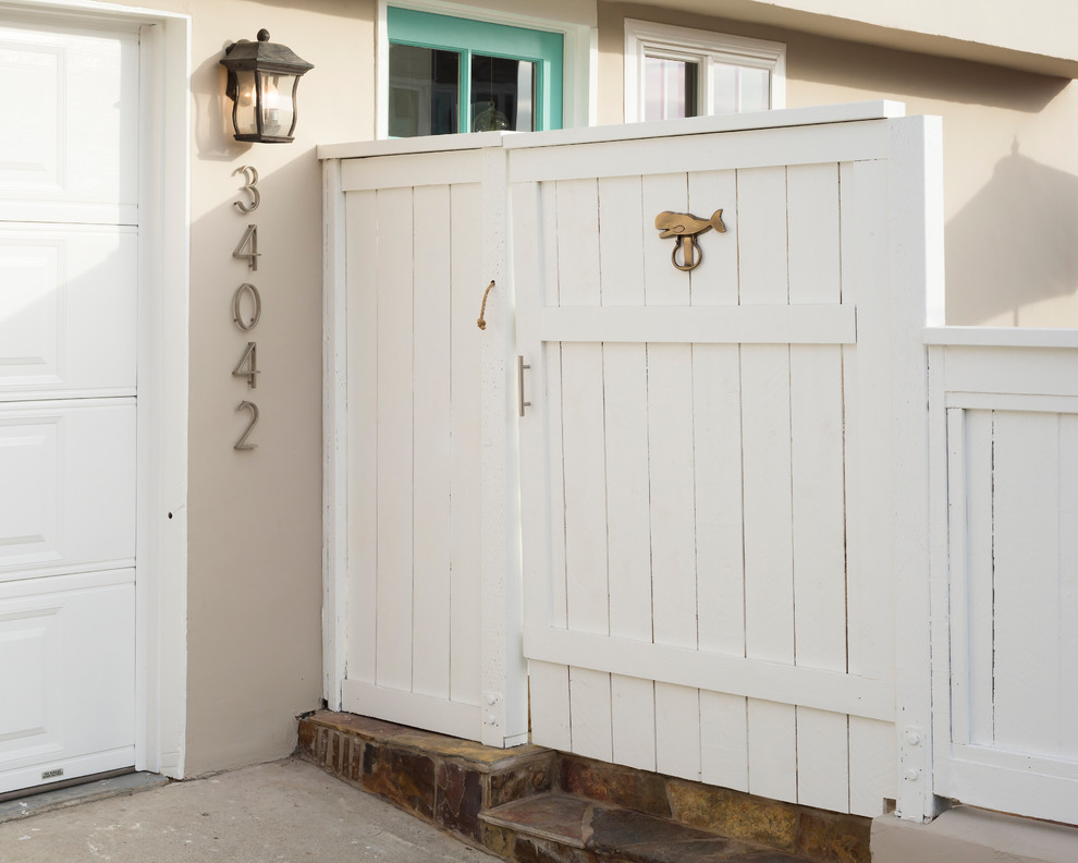 Small beach style entryway photo in Orange County